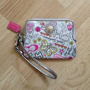 🌟COACH POPPY GRAFITTI BUTTERFLY WRISLET🌟