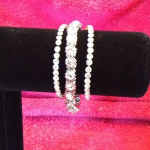 Traci Lynn Bunch of Bling Rhinestone Strech Brac.