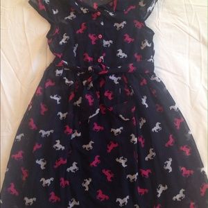 Girl's dress with Horse motif. Size L (10-12)