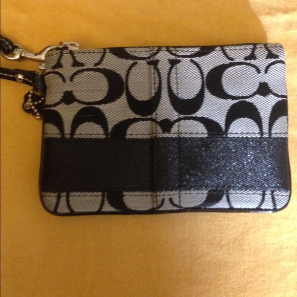 Gray/black Coach wristlet