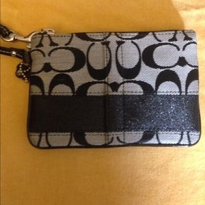 Gray/black Coach wristlet