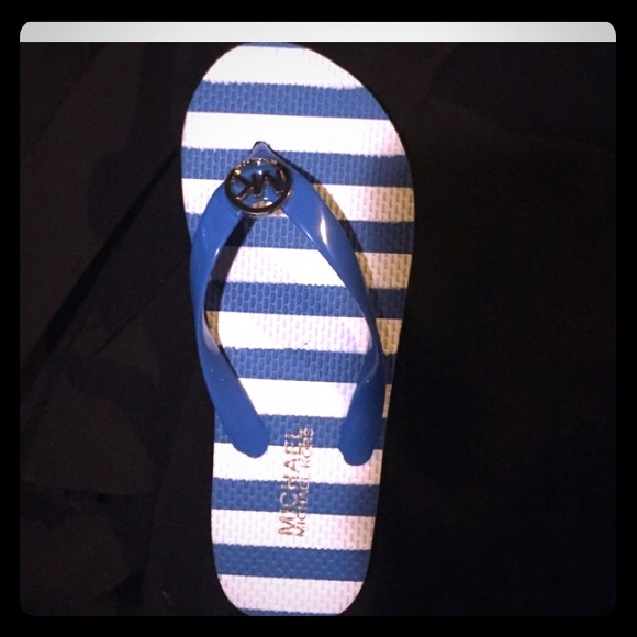 Michael K authentic flip flops, blue 5 but fits 4.