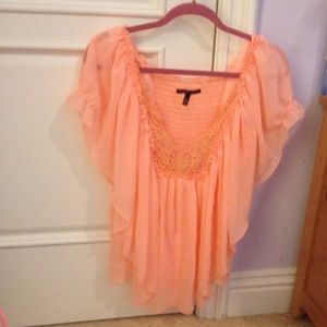 NWOT Victoria's Secret flowey  top. Never worn.