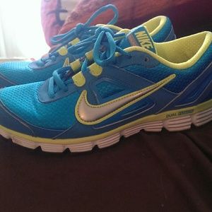 Nike blue and lime green shoes