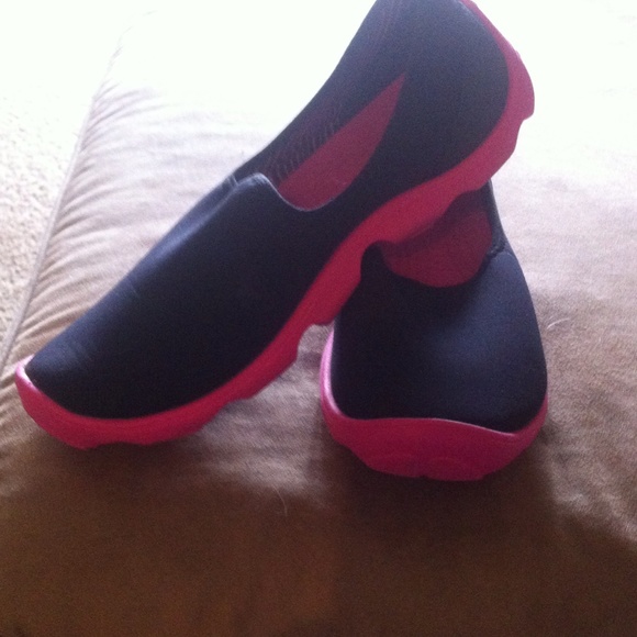 Hot pink and black Crocs