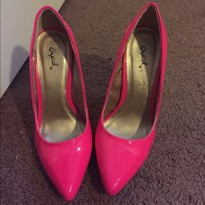 Neon pink heels