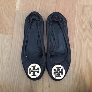 Tory Burch Black leather flats with gold medallion