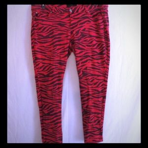 SOLD! Torrid Red and Black Animal Print Jeans