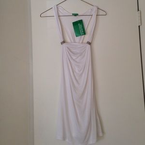 White dressy tank with silver accessories. S.