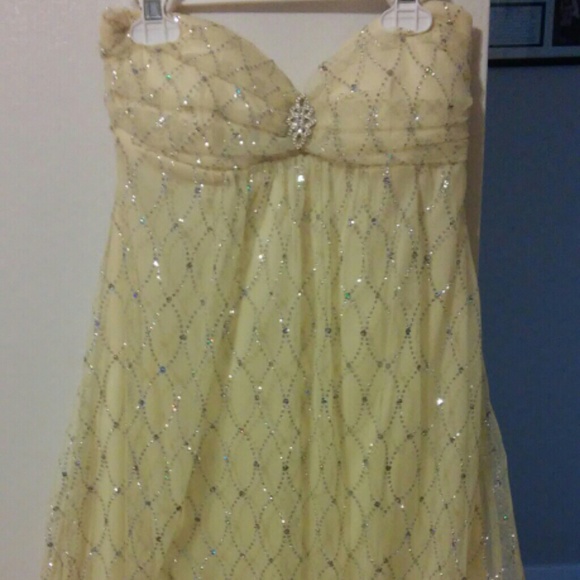 Short yellow sparkly dress