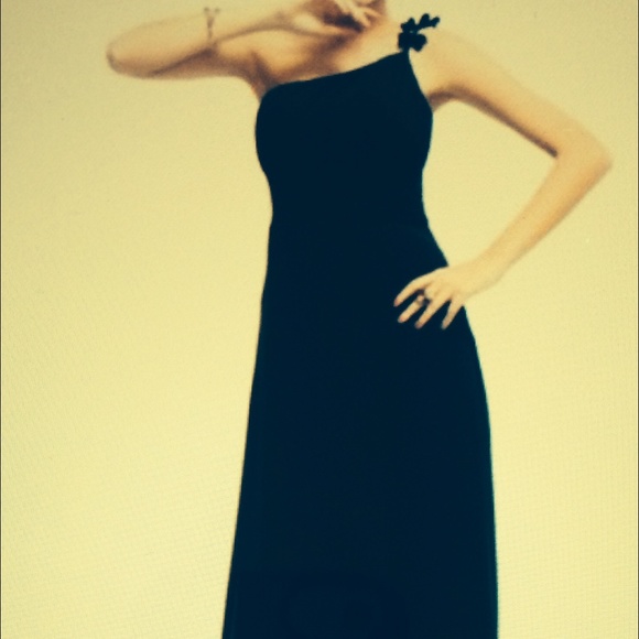 Brand new black evening gown. Never worn.