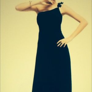 Brand new black evening gown. Never worn.