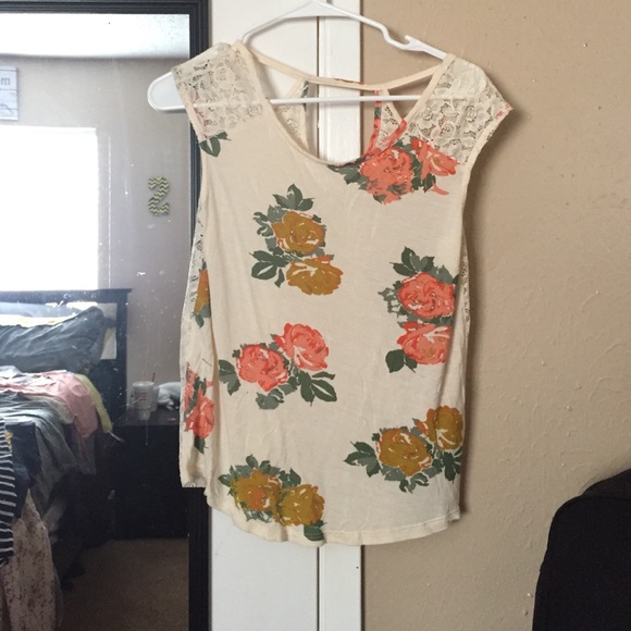 Cream colored top W/ flowers