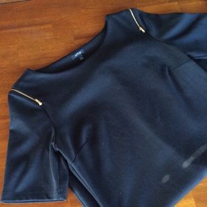 Black dress with gold zipper details