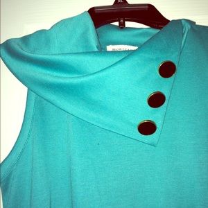 Cowl neck above-knee dress.