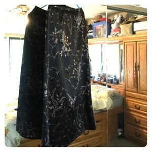 Long brown satiny looking skirt