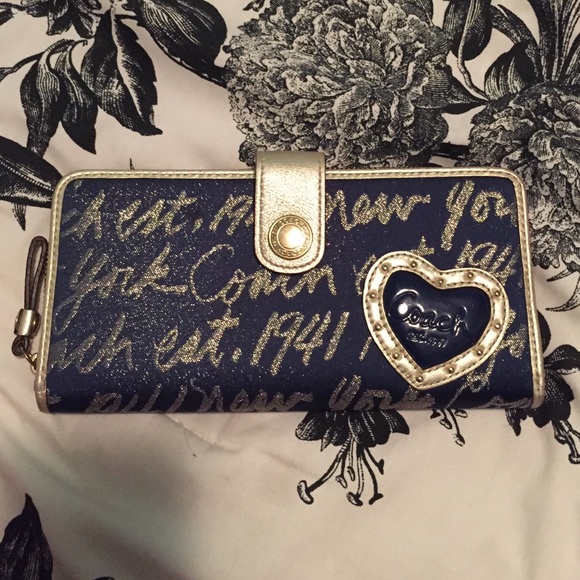 ONLY USED ONCE COACH WALLET