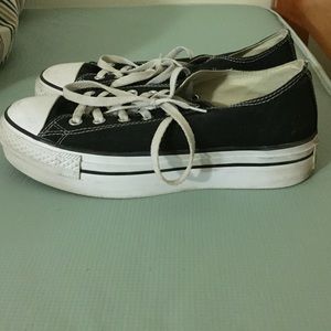 Black platform low top Chuck Taylor's