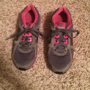 Pink Nike dual fusion running shoes