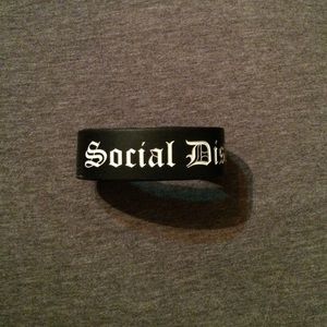 Social Distortion rubber bracelet from Hot Topic