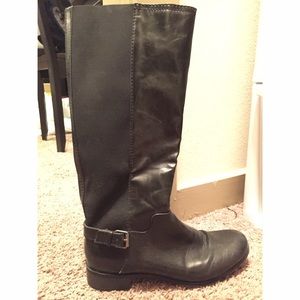 Tall black riding boots