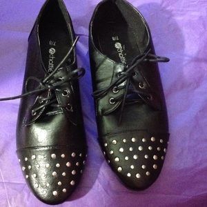 Black studded shoes