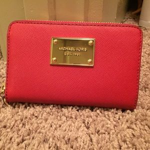 Red and gold Michael Kors wallet