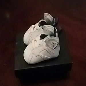 White and blue jordans