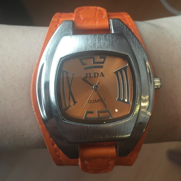 Orange faced fashion watch