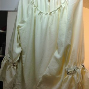Cream color peasant blouse.