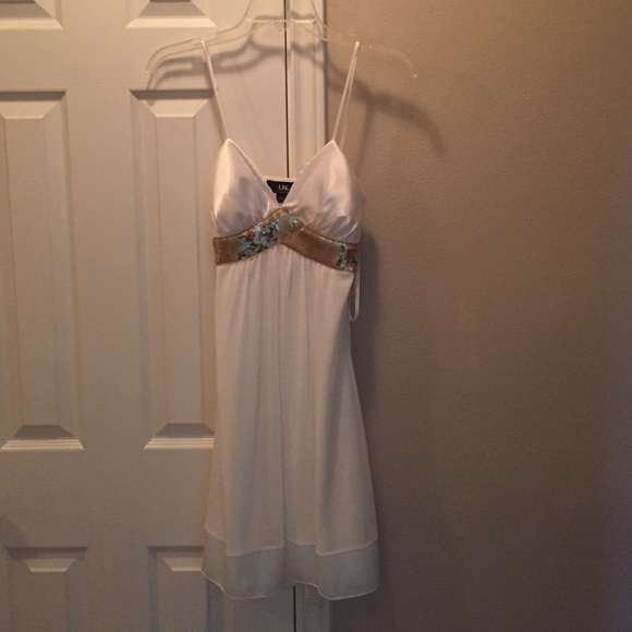 White and gold evening dress