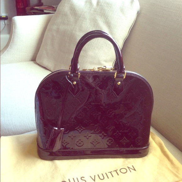 AUTHENTIC MONOGRAM VERNIS ALMA PM