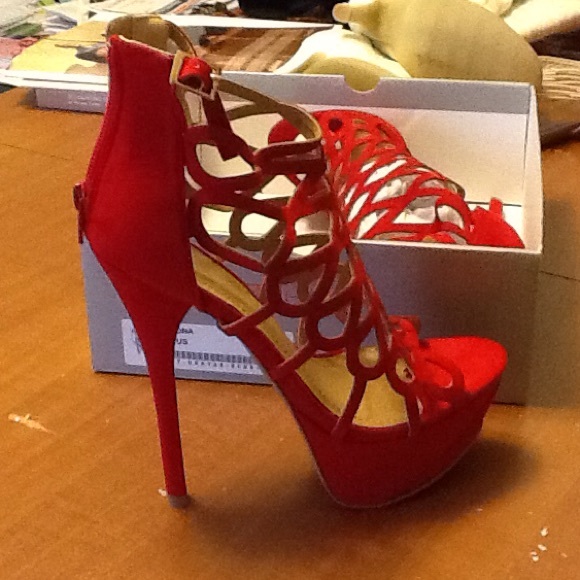 A pair of red sandals