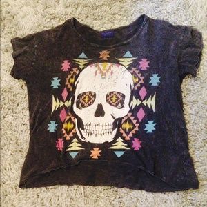 Crop top, with a skull and tribal design.