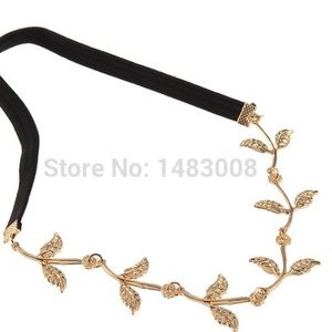 Grecian style gold leaf headband.