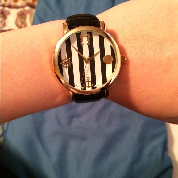 Black and white striped watch. - Picture 1 of 3