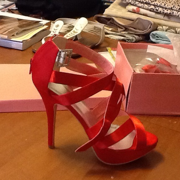 A pair of red sandals great for the prom