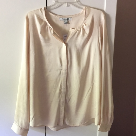 Brand new creme colored blouse!