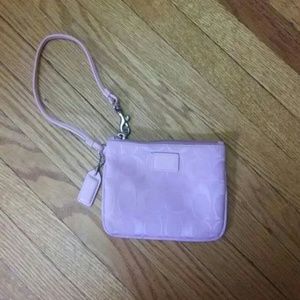 Light pink Coach wristlet