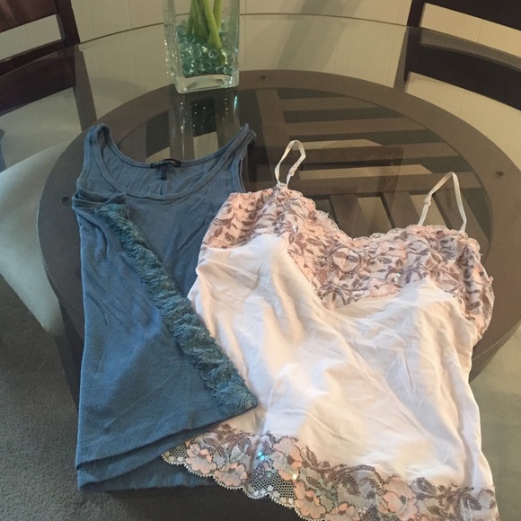 Two tanks. Express and Daisy Fuentes