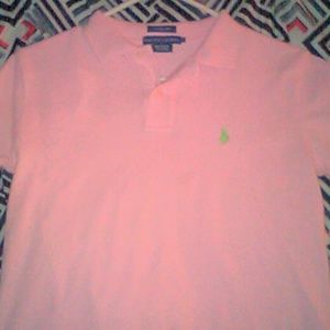 Pink Ralph Lauren women's polo shirt.
