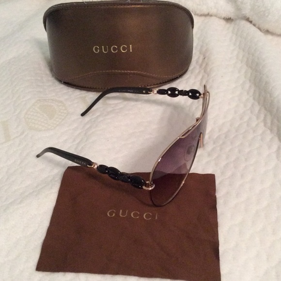 Gucci aviator sunglasses in gold