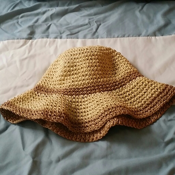 A summer straw like hat. In good condition.