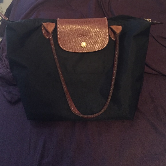 Black and brown long champ bag