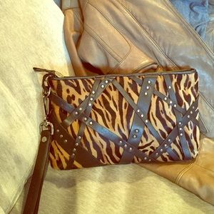 Donald pliner animal print large clutch