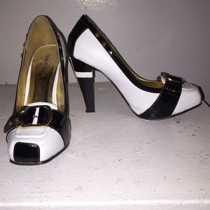 Black and white square toe pumps