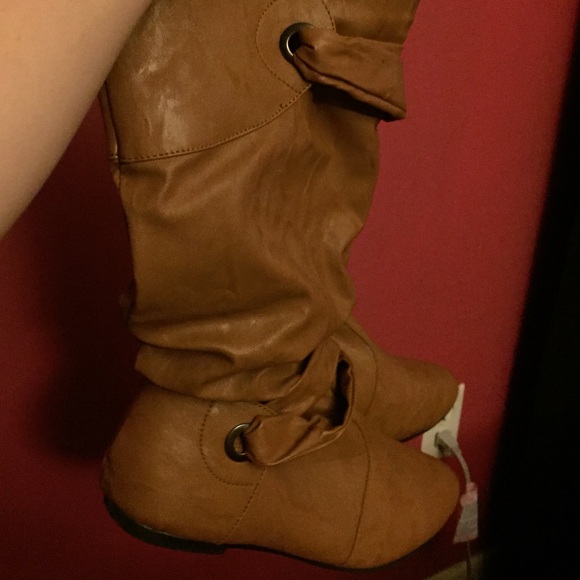 Brown ruffle boots