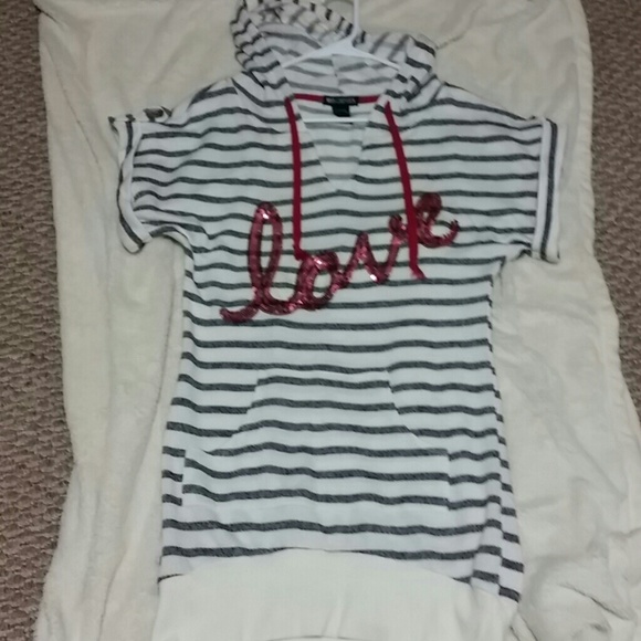 Small long tunic or dress...great with leggings!