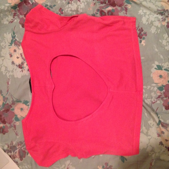 Pink cropped top.