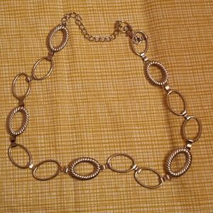 Silver Belt/ Free with a $25 or more purchase.